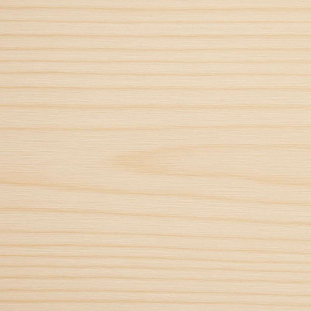 Nahaufnahme einer glatt gehobelten Accoya-Oberfläche mit hellem, fast cremefarbenem Ton und ruhiger Maserung.